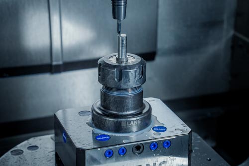 Chamfering a workpiece clamped in a Preci-Point collet chuck.